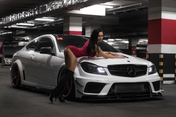 Sexy brunette and Mercedes C Class